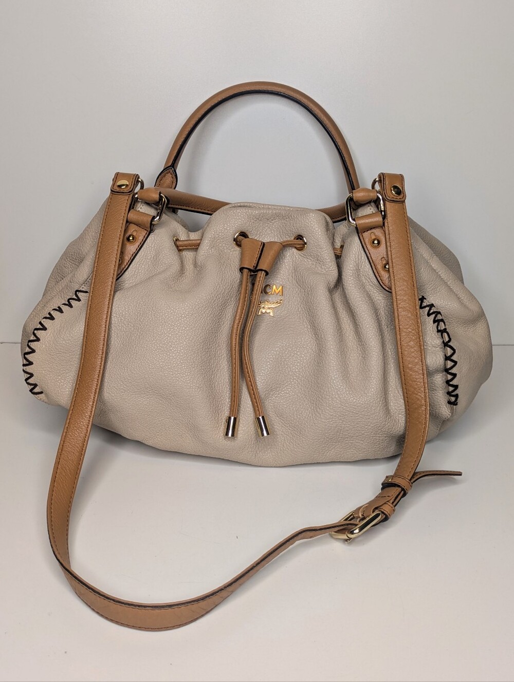 MCM Pebbled Leather Bucket Bag Drawstring Snap Close Cream Tan Tote Shoulder Bag
